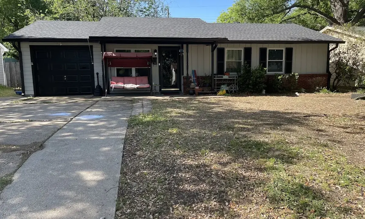 Asphalt Shingle Roof Repair crew at work on a residential roof in Pearland